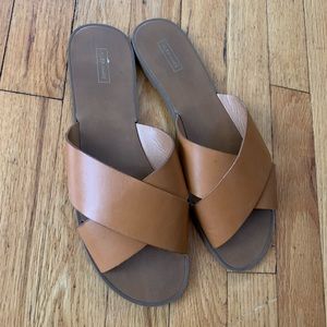 Size 9.5 slip on sandals, tan